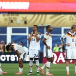 TOPSHOT - (From L) Germany's defender #03 Waldemar Anton, defender #18 Nathaniel Brown,  defender #24 Malick Thiaw, defender #04 Jonathan Tah and forward #11 Nick Woltemade react after losing the penalty shootout during the 2026 World Cup round of 32 football match between Germany and Paraguay at the Boston Stadium in Foxborough on June 29, 2026.  (Photo by FRANCK FIFE / AFP)